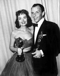 Donna Reed and Frank Sinatra accept Oscars