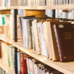 Photo of books on a library shelf